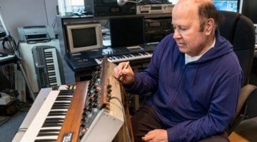 Jan Hammer signing the Model D Minimoog